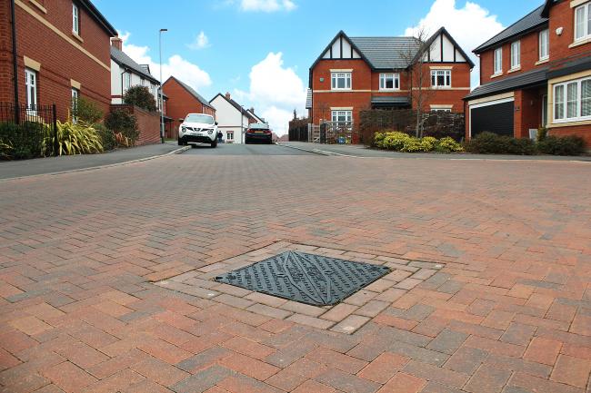 Highway manhole cover on a new build housing estate