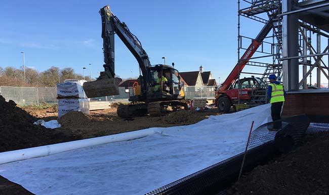 Geotextile being installed on site