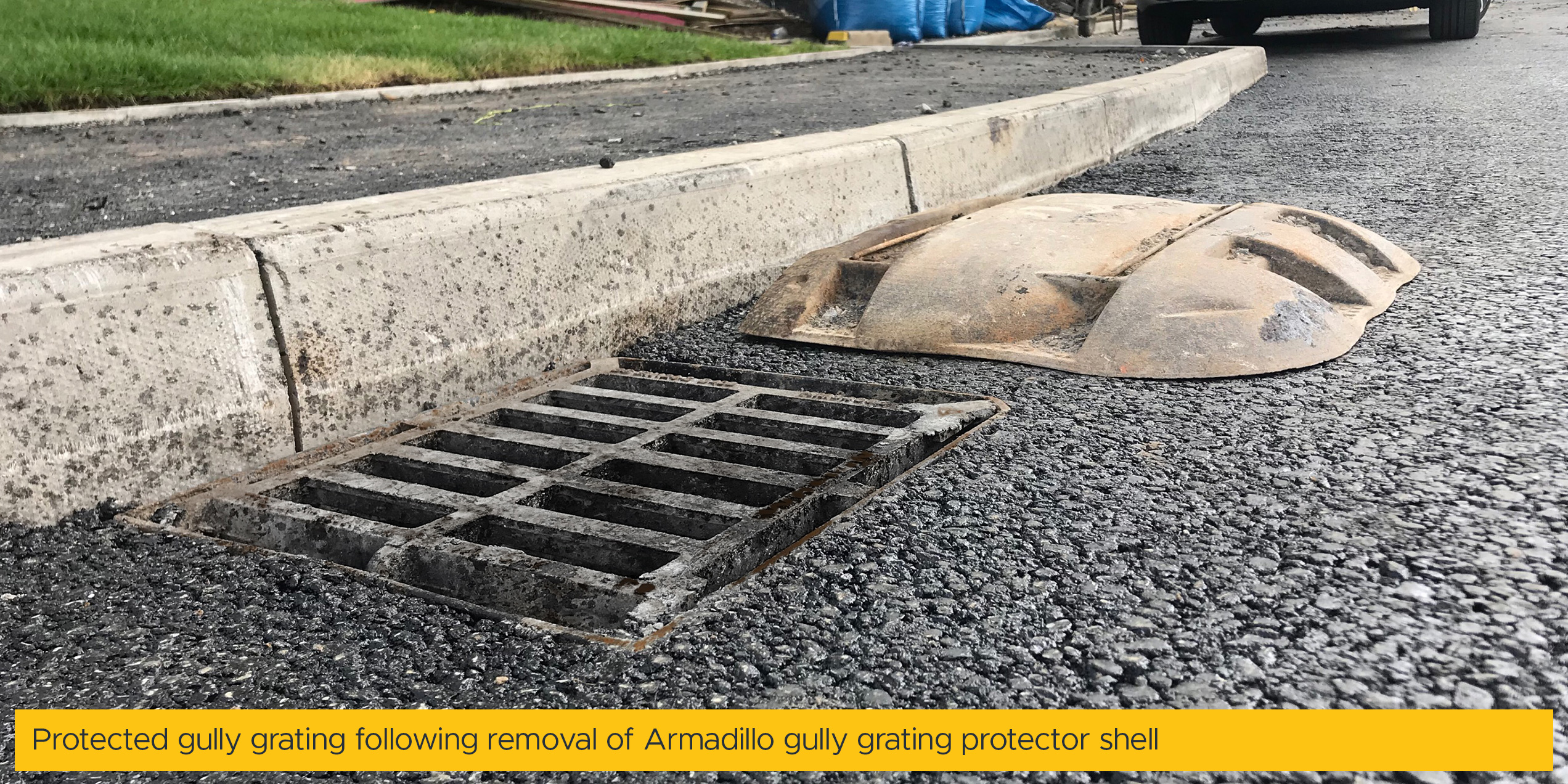 Protected gully grating following removal of Armadillo gully grating protector shell