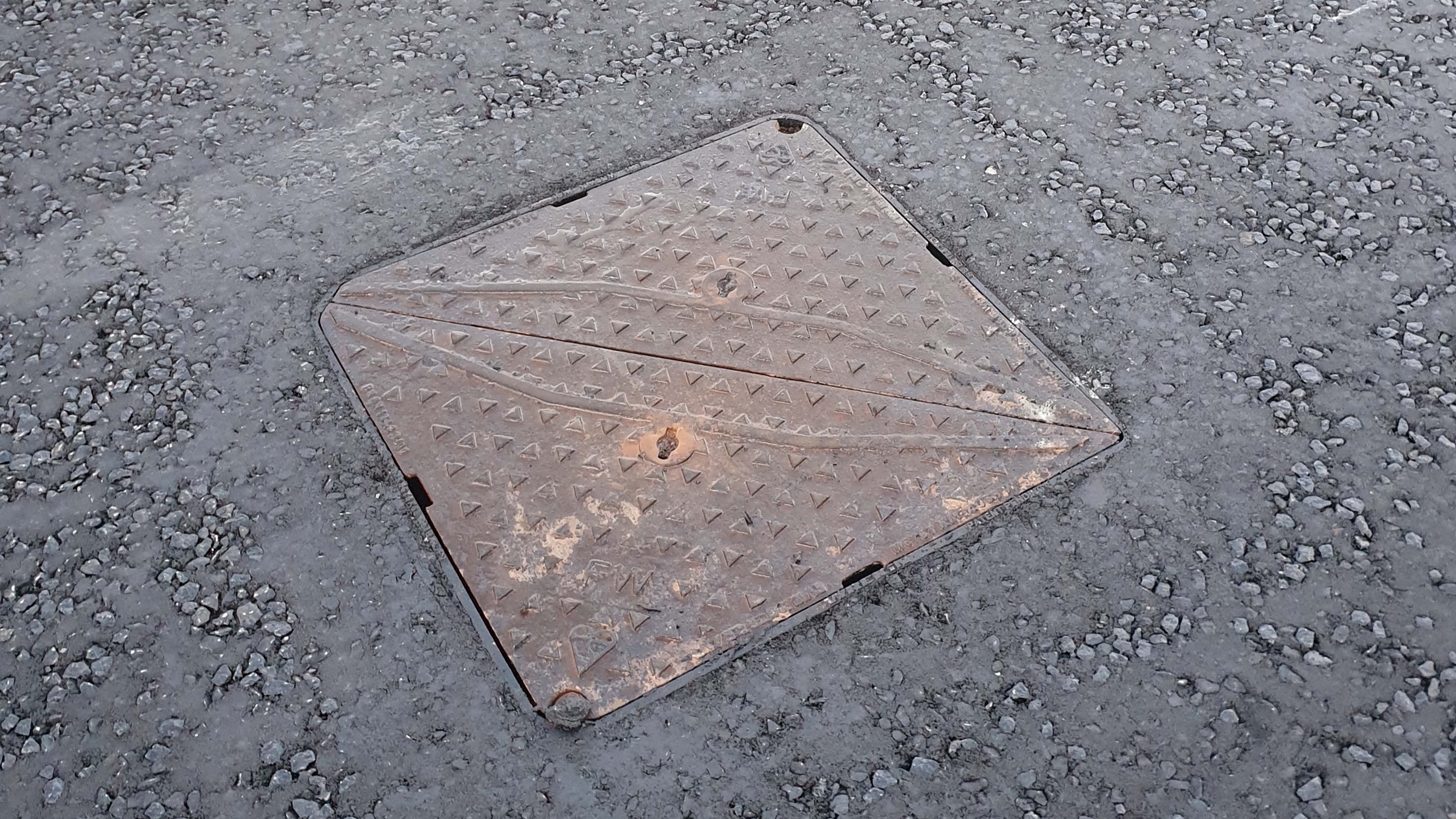 Road tarmacked and ClickLift installed with Manhole cover