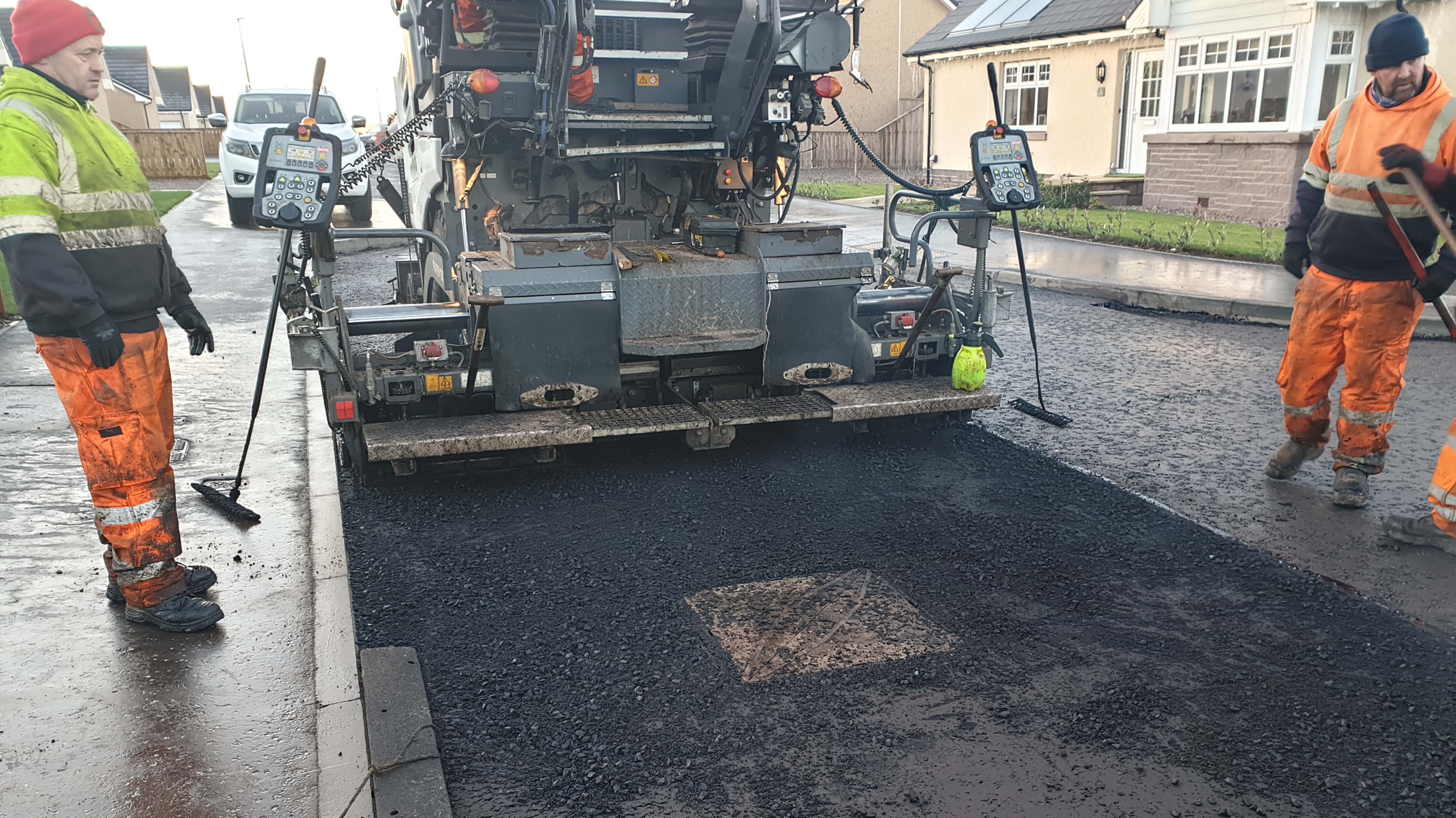 Completing road with ClickLift manhole system installed