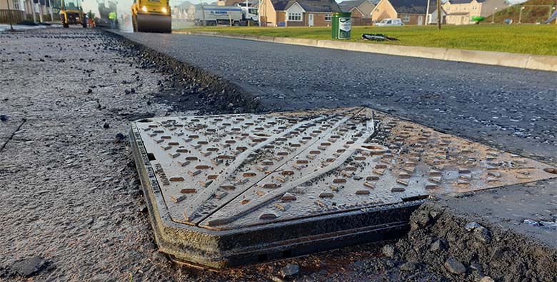 Road being tarmacked which has ClickLift manhole cover installed