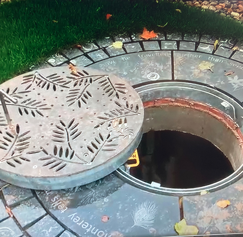 Sidmouth steel manhole cover with bespoke pattern