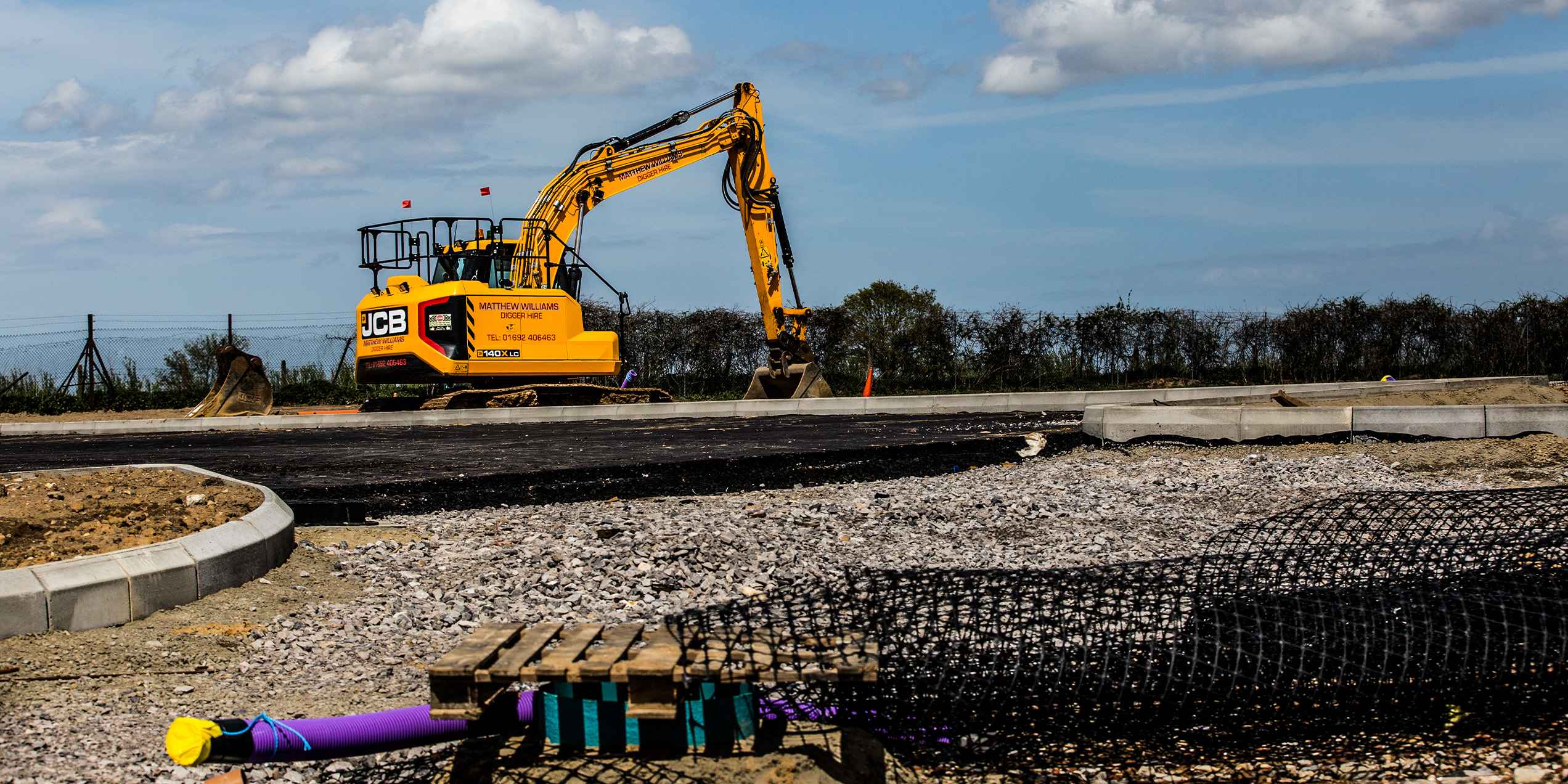 Construction vehicle working at Norwich North Recycling Centre