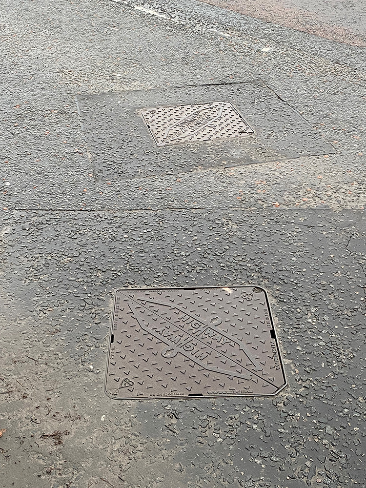 Highway manhole cover installed in a road