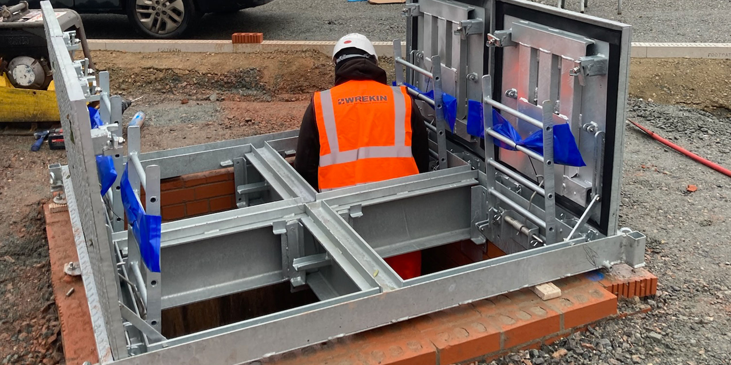 Bespoke access cover installation in progress by Wrekin Steel Installation Team