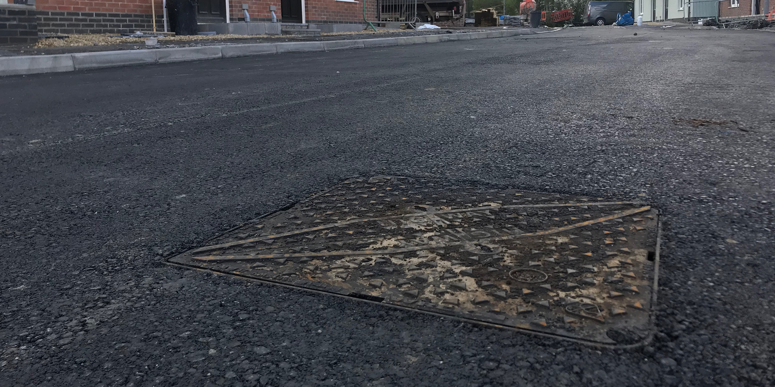 Protected manhole cover following removal of Armadillo manhole cover protector shell