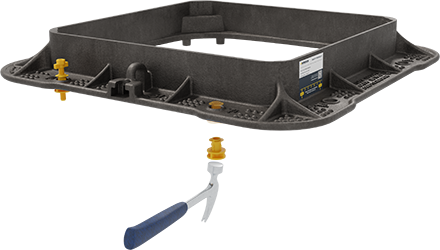 ScrewLift base unit being inserted into manhole cover frame