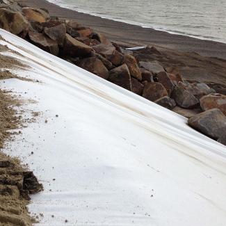MultiTrack being installed against sea wall