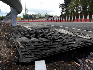 Unite Manhole cover installed on M27