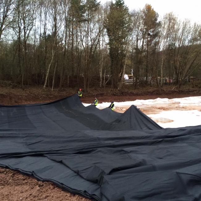 Geomembrane being installed