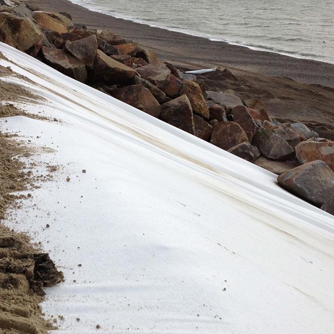 MultiTrack being installed against sea wall
