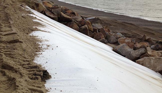 MultiTrack NW being installed against sea wall