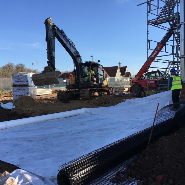 Geotextiles being installed on building site