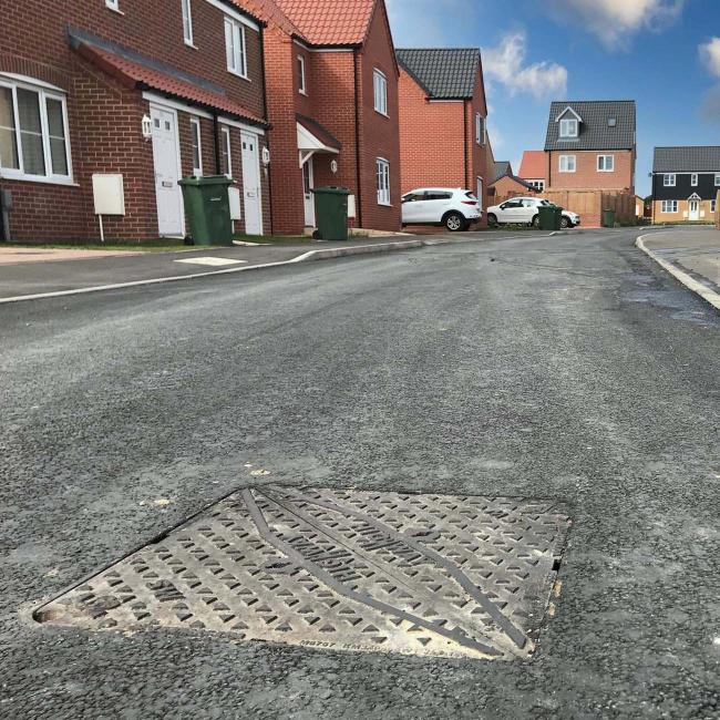 Highway D400 Manhole cover installed in road