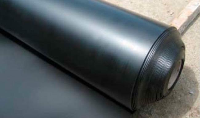 A roll of polypropylene impermeable geomembrane