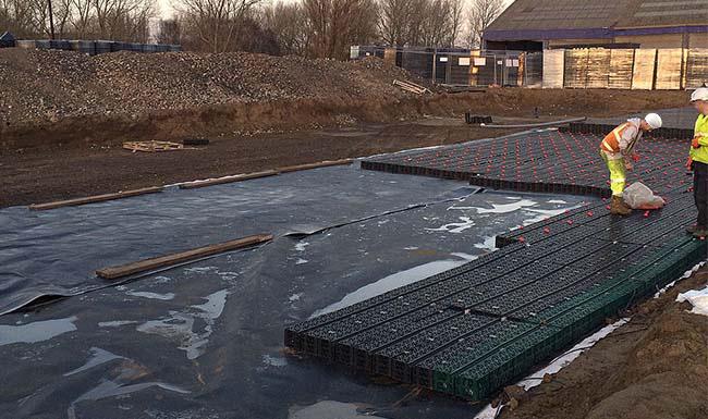 Geomembrane being installed on site
