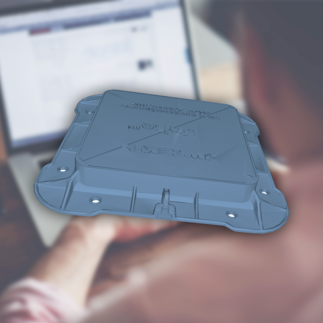 BIM model floating above a computer