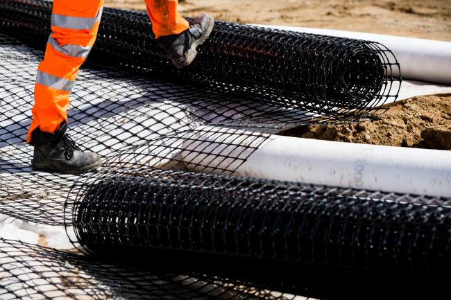 A geogrid being unrolled
