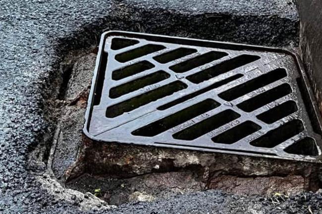 Poorly installed ironwork jutting from the ground